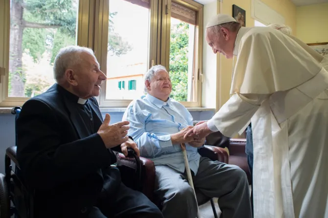 Pope Francis greets the elderly priest-residents of Casa San Gaetano in Rome on June 17, 2016.