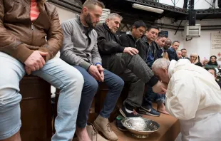 Pope Francis washes inmates’ feet at Rome’s Regina Coeli Prison on Holy Thursday, March 29, 2018. Vatican Media.