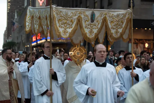 The Blessed Sacrament passes by during an Oct. 10, 2023, Eucharistic procession on the streets of New York City. Credit: Jeffrey Bruno