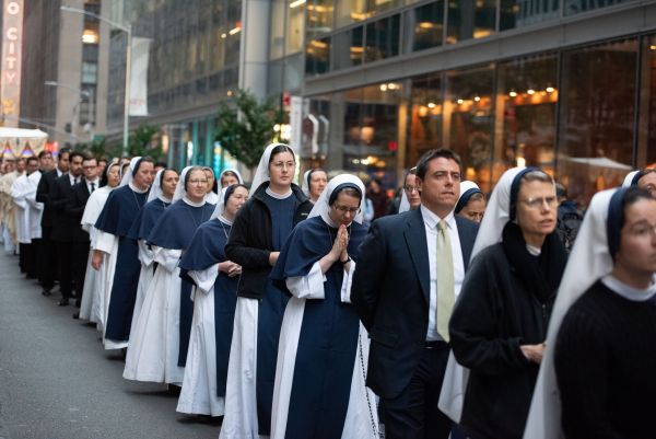 Religious sisters process through the streets of New York City with the Blessed Sacrament on Oct. 10, 2023. Credit: Jeffrey Bruno