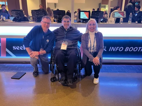 Nick Matrisotto, Father Mike Esswein, and Cathy Hencken from Annunciation/Our Lady of Providence parishes in St. Louis at the SEEK24 conference in St. Louis. Credit: Colleen Beckemeyer