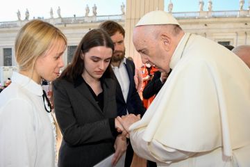 Pope Francis meets Kateryna Prokopenko and Yulya Fedosiuk in St. Peter’s Square on May 11, 2022