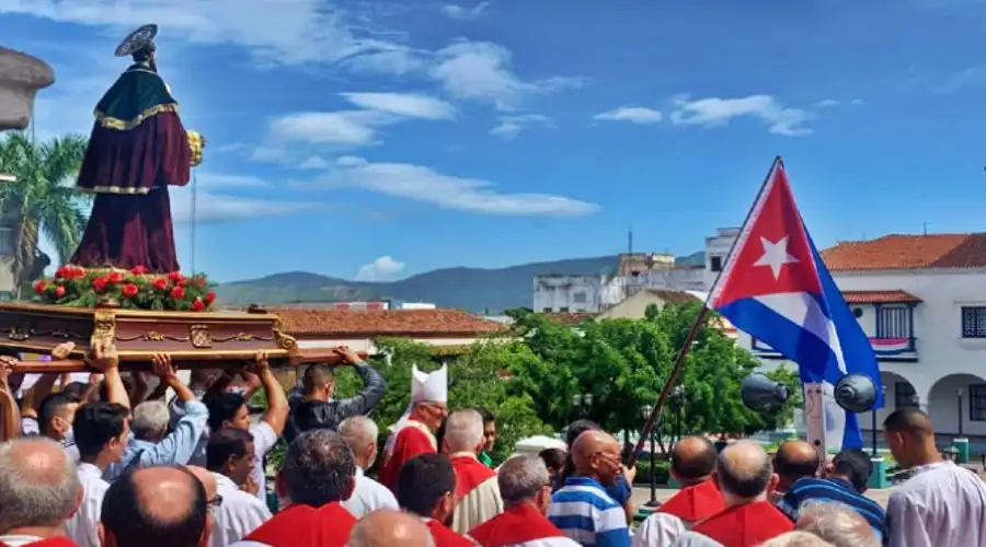 Cuban Catholics process with a statute of St. James on July 25, 2022, the saint's feast day, in Santiago de Cuba, Cuba.?w=200&h=150