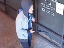 A man wielding a machete is shown in security footage outside Alternatives Pregnancy Center in Sacramento, California, at 8:15 a.m. on July 8, 2022.