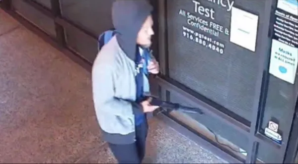 A man wielding a machete is shown in security footage outside Alternatives Pregnancy Center in Sacramento, Calif., at 8:15 a.m. on July 8, 2022. Credit: Courtesy of Alternatives Pregnancy Center