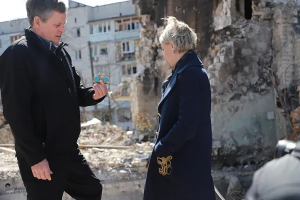 Sen. Steve Daines (R-Montana) examines a child's toy amid rubble in Ukraine, April 14, 2022. Courtesy photo