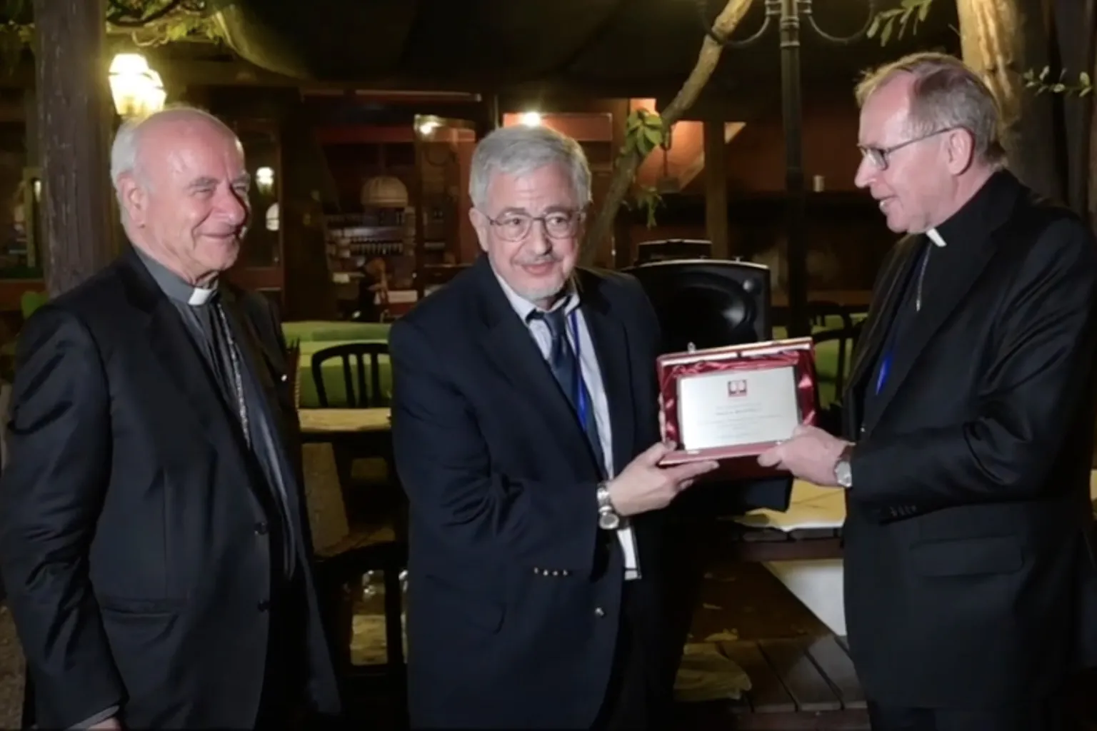 Dale Recinella (C) accepts the Pontifical Academy for Life's Guardian of Life Award from Archbishop Vincenzo Paglia (L) and Cardinal Wim Eijk (R), Sept. 28, 2021.?w=200&h=150