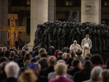 Pope Francis prayed for migrants and refugees with the delegates of the Synod on Synodality at St. Peter's Square on Thursday evening, Oct. 19, 2023.