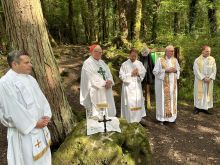 Irish-American Cardinal Timothy Dolan of New York celebrated Mass at a “Mass rock” in Killarney, County Kerry, Ireland, during a pilgrimage with roughly 40 people from the Archdiocese of New York on Aug. 21, 2023. Pictured left to right: Father Enrique Salvo, Cardinal Dolan, Father Stephen Ries, Monsignor Dennis Keane, Bishop Edmund Whalen, all from the New York Archdiocese.