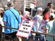 A young pro-lifer holds a sign that says “No human is a mistake” at the Colorado March for Life in Denver on Friday, April 11, 2025.