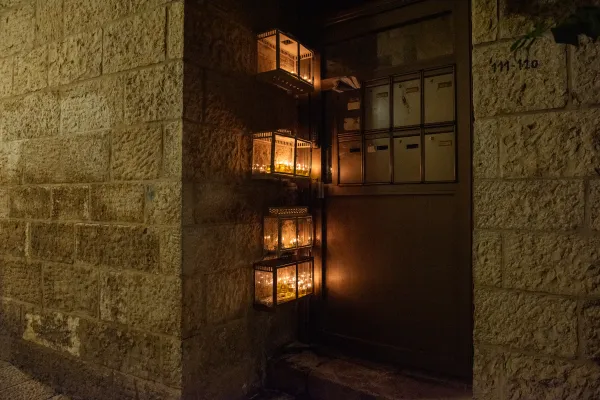 Some Hanukkah lights displayed in the streets of the Jewish Quarter, inside typical small boxes, in Jerusalem's Old City on Dec 7, 2023. Credit: Marinella Bandini