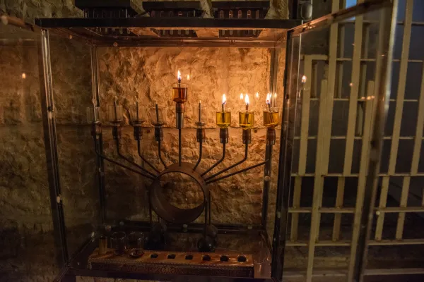Some Hanukkah lights inside a typical small box along the streets of the Jewish Quarter in Jerusalem's Old City on Dec 12, 2023. Credit: Marinella Bandini