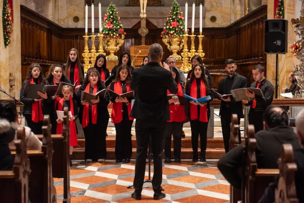 One of the parish choirs of the Church of St. Saviour in Jerusalem performing at the prayer vigil in preparation for Christmas, held on Dec. 22, 2023, in Jerusalem. Credit: Marinella Bandini