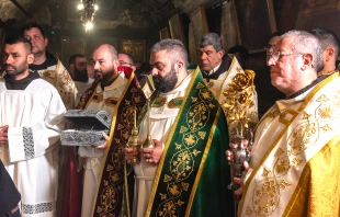 Three Franciscan friars portray the Magi in Bethlehem on the afternoon of Jan. 6, 2024. After the Second Vespers of the Epiphany, they descended in the Grotto of the Nativity in Bethlehem, where they brought their gifts to the places of Jesus' manifestation. Credit: Marinella Bandini