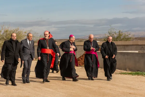Latin Patriarch of Jerusalem Cardinal Pierbattista Pizzaballa arrives at the Latin church baptism site on Friday, Jan. 12, 2024, for the annual celebration of the feast of the baptism of Jesus with the local community. To his right is Dr. Imad Hijazin, secretary general of the Ministry of Tourism and Antiquities. On his left is Monsignor Giovanni Pietro Dal Toso, apostolic nuncio to the Hashemite Kingdom of Jordan, and Monsignor Jamal Daibes, patriarchal vicar in Jordan (until Saturday, Jan. 13, when he was appointed as the new bishop of Djibouti). Credit: Marinella Bandini
