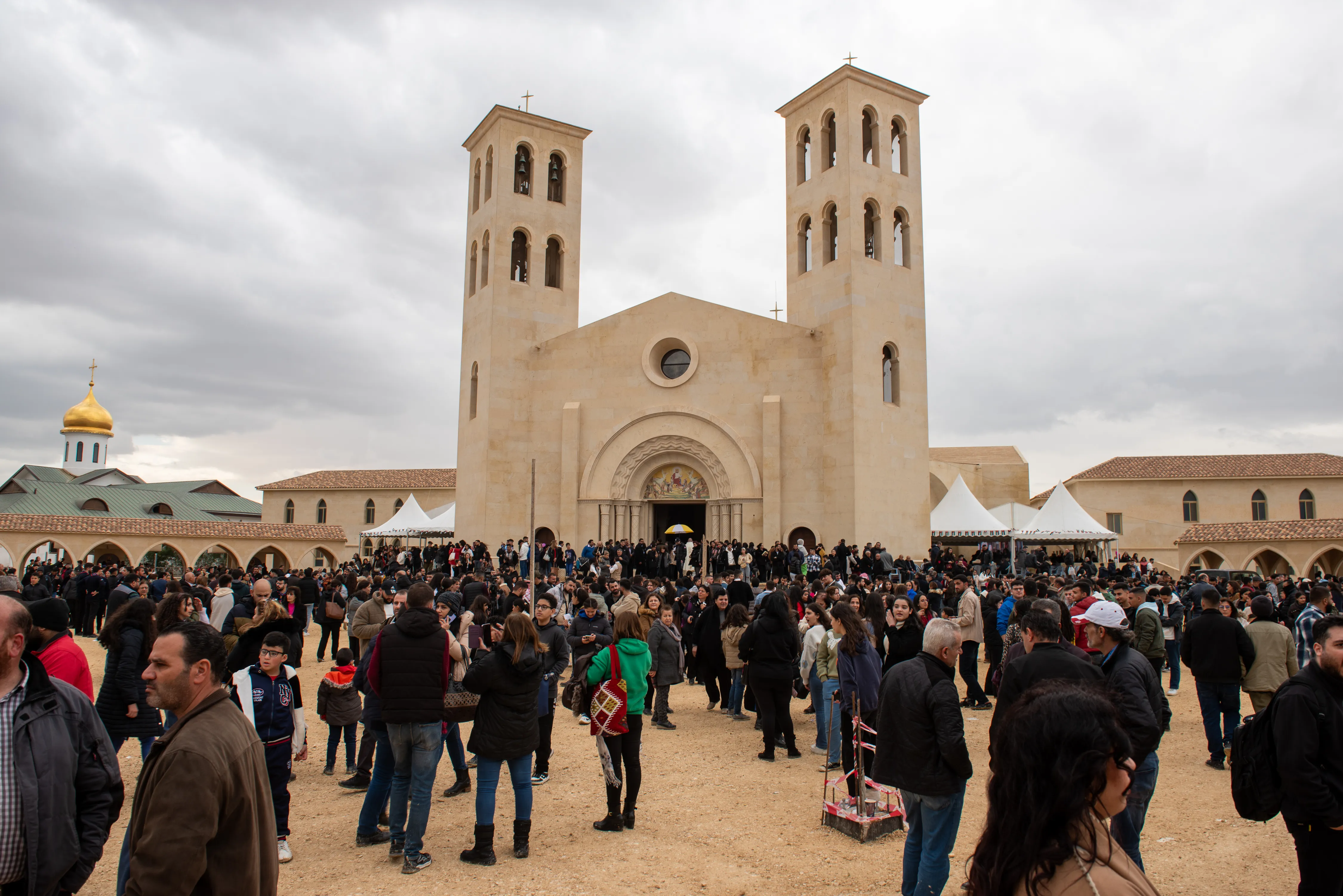 Worshipers in front of the Latin church dedicated to the Baptism of Jesus, in the locality known as "Bethany beyond the Jordan," at the exit of the Mass of the feast of Baptism, on Friday, Jan. 12, 2024.?w=200&h=150