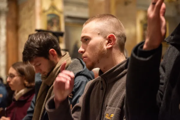 Daniel Karg, a theology student participating in the Studienjahr, during a prayer in St. Saviour Church (Jerusalem) in the context of the Week of prayer for the Christian unity, January 2024. Credit: Marinella Bandini