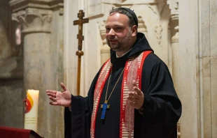 Father Nikodemus Schnabel, abbot of the Benedictine Basilica of the Dormition in Jerusalem, speaks during an ecumenical prayer service that took place at the Cenacle on Jan. 25, 2024. Credit: Marinella Bandini