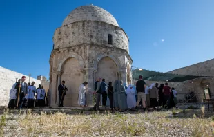 An external view of the Chapel of the Ascension on the Mount of Olives in Jerusalem during the procession of the Franciscan friars after the first vespers of the Ascension solemnity on May 8, 2024. The procession circled the chapel three times. Credit: Marinella Bandini