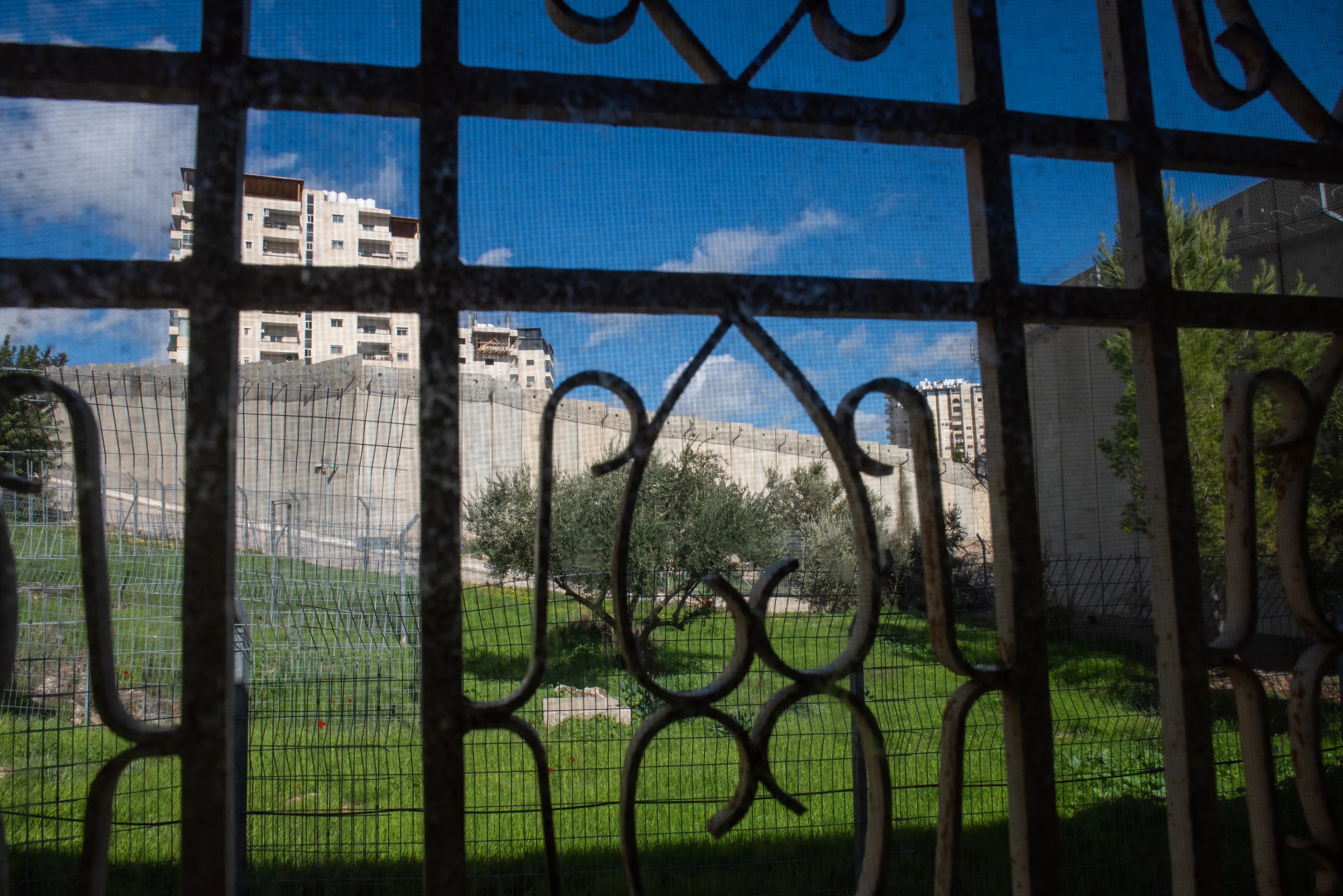 A view of the separation wall between Israel and the Palestinian Territories from behind a window in the Comboni Sisters' house in East Jerusalem.?w=200&h=150