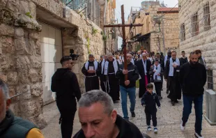 Students and teachers from Jerusalem Christian schools walk the Way of the Cross on the Via Dolorosa in Jerusalem. The yearly event was organized by the Custody of the Holy Land on Friday, Feb. 23, 2024, on the occasion of Lent. Credit: Marinella Bandini