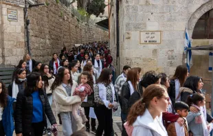 On Friday, Feb. 23, 2024, approximately 1,000 children and youth from Christian schools in Jerusalem walked the Via Dolorosa in the Old City, offering prayers for peace. The crowd brought life to the streets of the Holy City for the first time since the outbreak of the Israel-Hamas war last October. Credit: Marinella Bandini