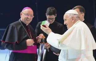 Pope Francis holds a puzzle cube during his meeting with young people at a sports arena in Budapest, Hungary, on April 29, 2023. Vatican Media