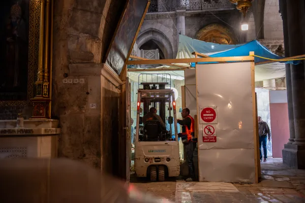 The entrance to a construction site area inside the Basilica of the Holy Sepulcher in Jerusalem. Flooring restoration work, which affects the entire basilica, has been underway for two years. Credit: Marinella Bandini