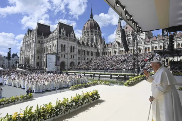 Pope Francis stands on an altar erected outside the Parliament Building in Budapest's Kossuth Lajos' Square during a public outdoor Mass on April 30, 2023. Vatican Media