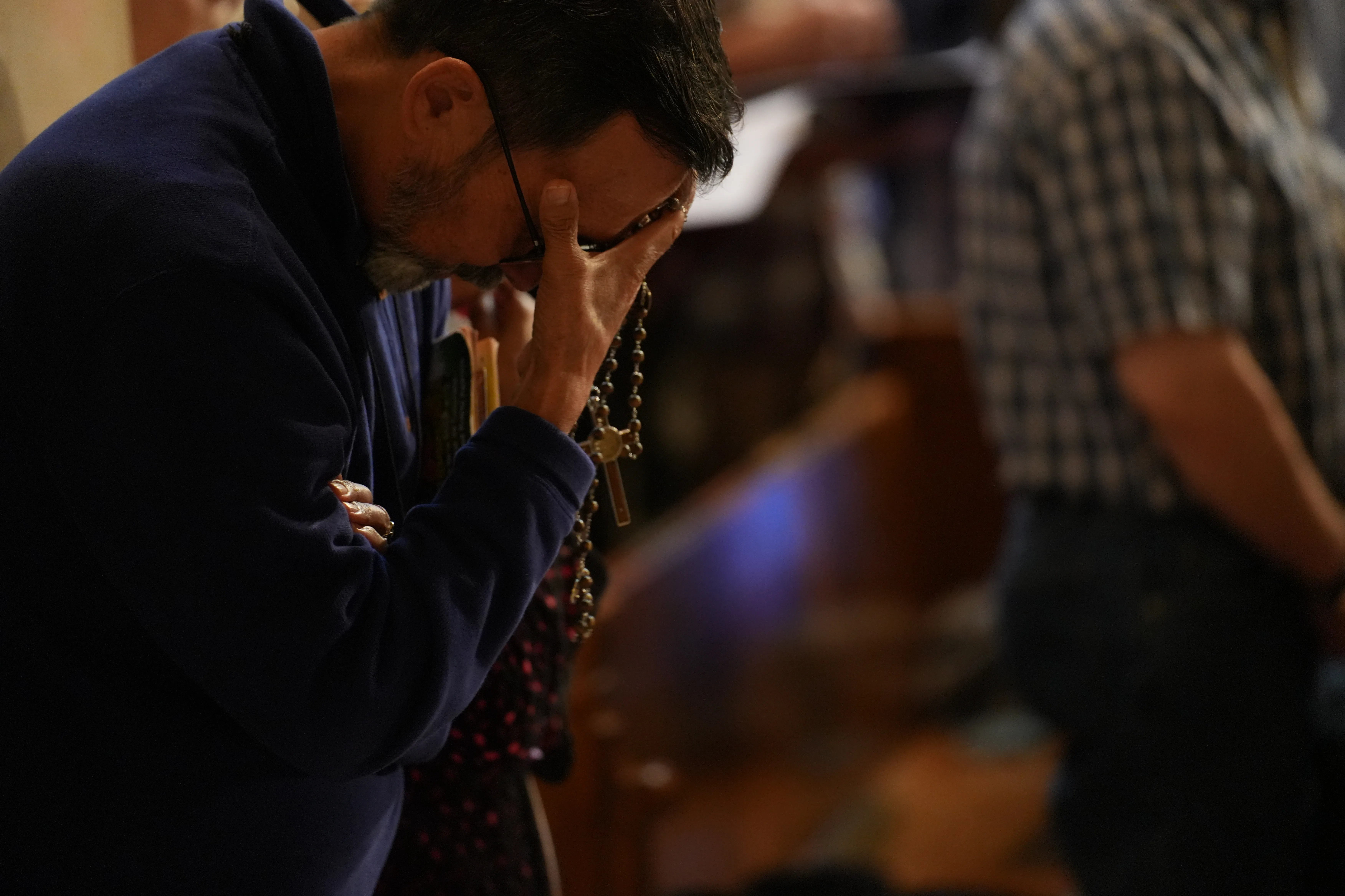 A man prays the rosary during a daylong event on Sept. 30, 2023, in Washington, D.C., focused on praying and reflecting on the rosary to conclude a nine-month rosary novena.?w=200&h=150