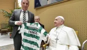Pope Francis meets with professional soccer players from the Celtic Football Club, a team founded by an Irish Catholic religious brother, on Wednesday, Nov. 29, 2023, at the Vatican.