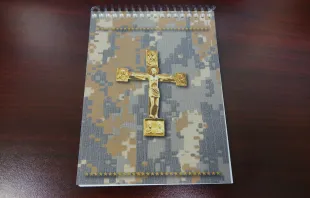 The latest edition of "Armed with the Faith: A Catholic Handbook for Military Personnel," is designed to hold up in arduous conditions, "with features including waterproof and tear-resistant stock, and plastic binders that enable the turning of pages without a sound.” Courtesy of the Archdiocese for the Military Services