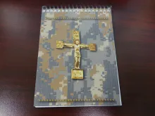 The latest edition of "Armed with the Faith: A Catholic Handbook for Military Personnel," is designed to hold up in arduous conditions, "with features including waterproof and tear-resistant stock, and plastic binders that enable the turning of pages without a sound.”