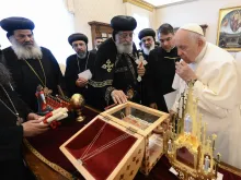 Pope Francis receives relics of the Coptic martyrs from Pope Tawadros II, the head of the Coptic Orthodox Church of Alexandria, May 11, 2023. Pope Francis also announced that the 21 men will be added to the Church’s official list of saints.