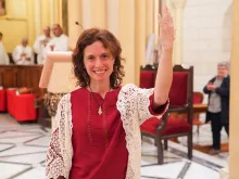 At the end of the Mass of consecration on Nov. 1, 2023, María Ruiz Rodríguez shows the ring symbolizing her membership in the Ordo Virginum. That's the only outward sign of her consecration.