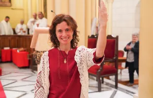 At the end of the Mass of consecration on Nov. 1, 2023, María Ruiz Rodríguez shows the ring symbolizing her membership in the Ordo Virginum. That's the only outward sign of her consecration. Credit: Latin Patriarchate of Jerusalem