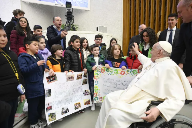 Pope Francis greets young students at the general audience on Feb. 15, 2023.