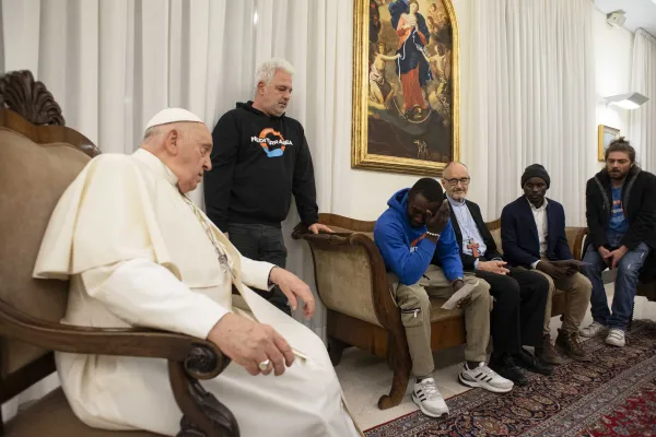 Pope Francis has an emotional meeting Nov. 17, 2023, with African migrant Mbengue Nyimbilo Crepin, who lost his wife and daughter crossing the desert in Tunisia. Credit: Vatican Media