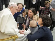 Pope Francis greets families after the general audience on Feb. 2, 2022