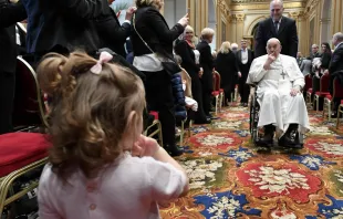 Pope Francis engages with a youngster at the inauguration of the 95th Judicial Year of the Vatican City State on Saturday, March 2, 2024. Credit: Vatican Media