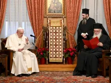 Pope Francis speaks to His Beatitude Ieronymos II and other Greek Orthodox leaders in Athens Dec. 4.