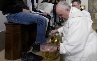 Pope Francis washes the feet of 12 young men and women, inmates at Casal del Marmo juvenile detention center on Rome’s outskirts, during a Mass of the Lord’s Supper on Thursday, April 6, 2023. Credit: Vatican Media