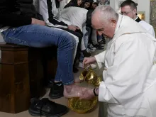 Pope Francis washes the feet of 12 young men and women, inmates at Casal del Marmo juvenile detention center on Rome’s outskirts, during a Mass of the Lord’s Supper on Thursday, April 6, 2023.