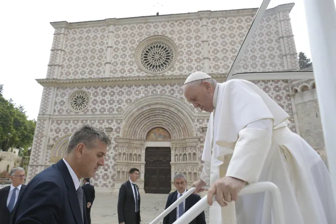 Pope Francis arrives at L’Aquila’s Basilica of Santa Maria di Collemaggio.