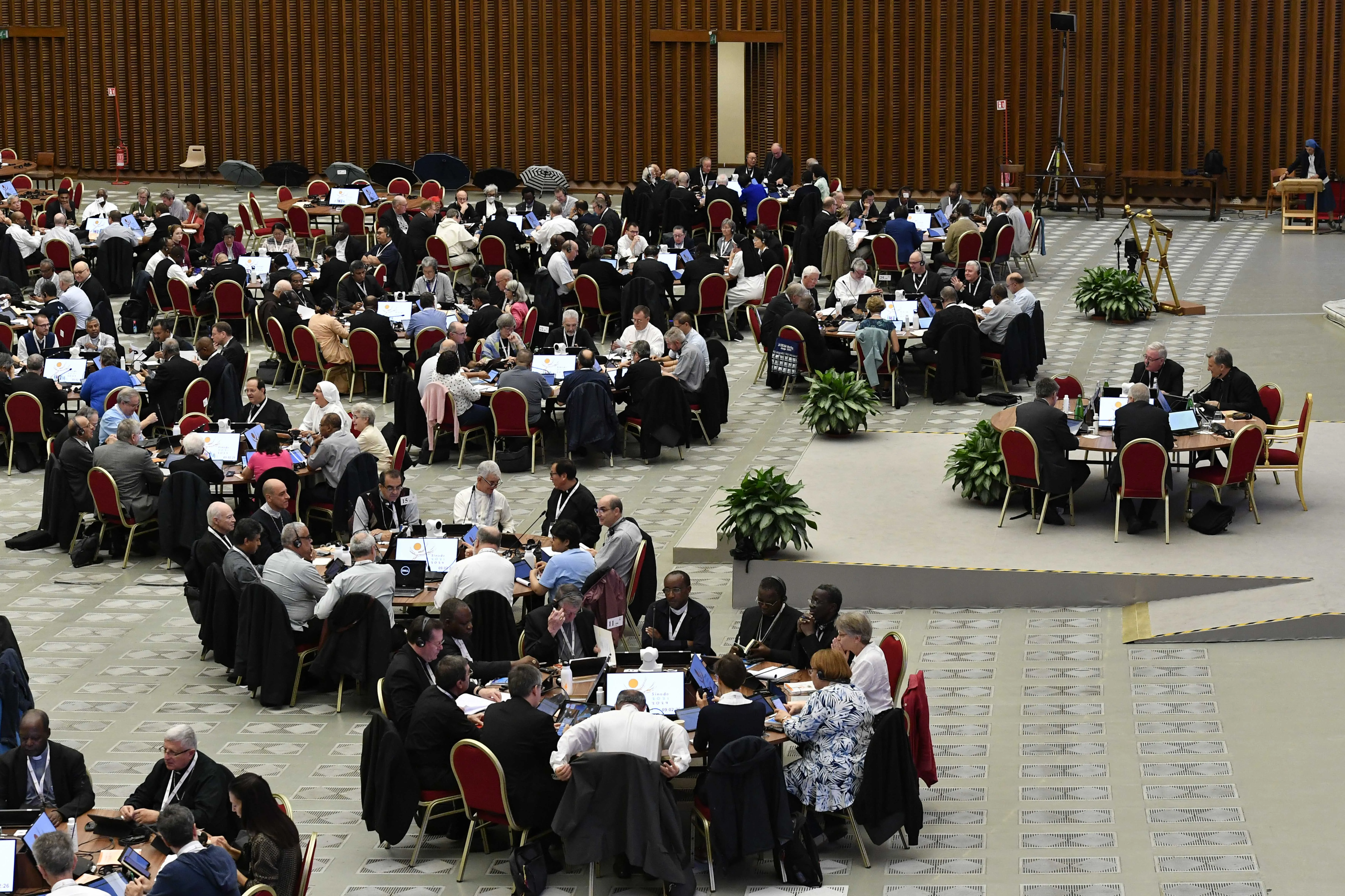 Synod on Synodality delegates meet in round table discussion groups Oct. 21, 2023.?w=200&h=150