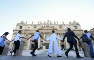 Young people from around the world held hands in St. Peter's Square during the #NotAlone human fraternity event June 10, 2023. Vatican Media