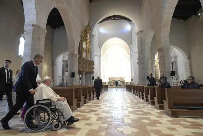 Pope Francis inside at L’Aquila’s Basilica of Santa Maria di Collemaggio.