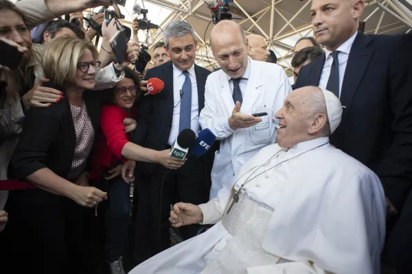 Pope Francis greeted media with surgeon Dr. Sergio Alfieri before leaving Rome's Gemelli Hospital shortly before 9:00 a.m. on June 16, 2023. Before returning to the Vatican, he stopped to pray in front of the historic Marian icon of Salus Populi Romani at St. Mary Major Basilica, and made a quick visit to a group of religious sisters close to St. Peter's Square. Vatican Media.