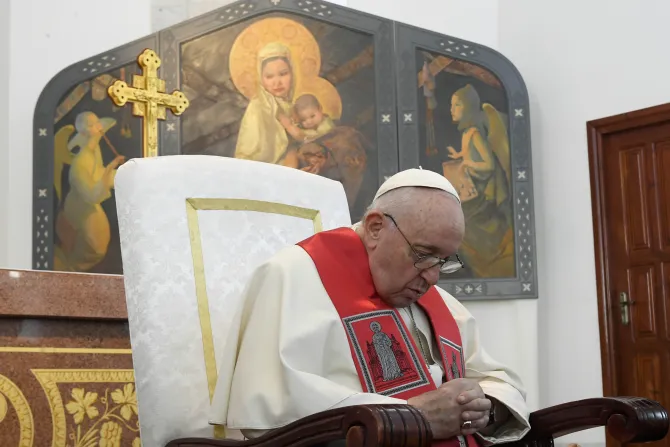 Pope Francis praying in Our Mother of Perpetual Help Cathedral on Sept. 15, 2022