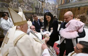 Pope Francis baptizes babies in the Sistine Chapel on Jan. 7, 2024. Credit; Vatican Media